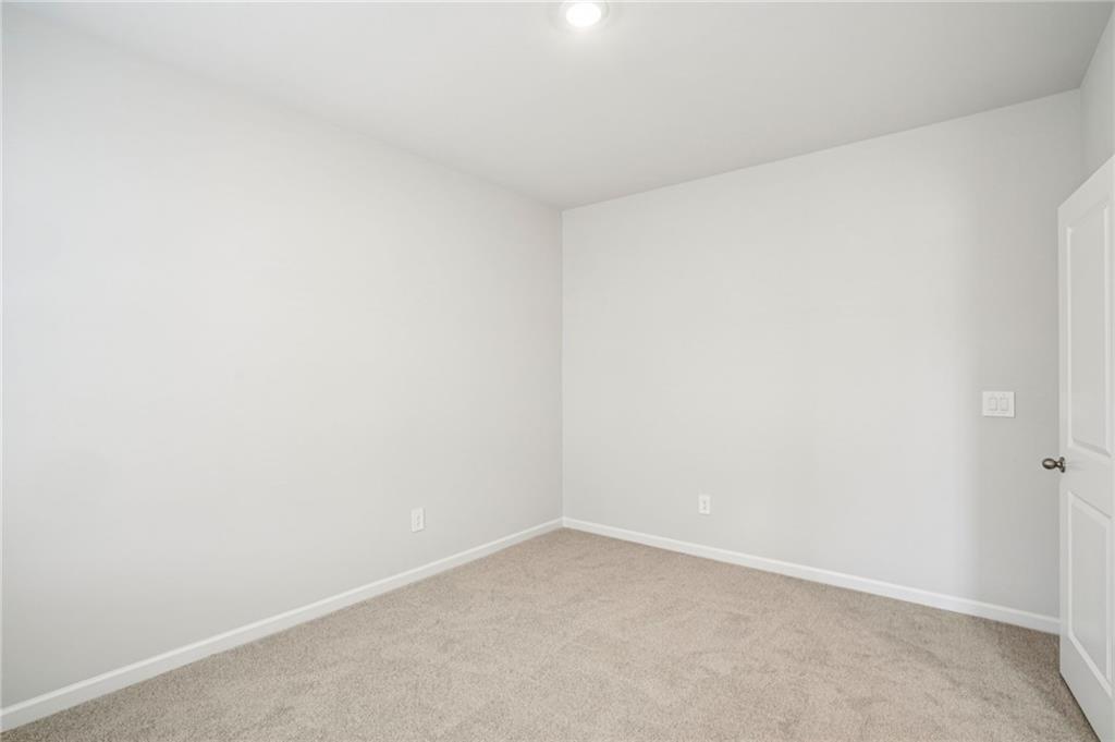 6939 Winchester Place Fairburn, GA 30213 - Photo 18 of 56 a view of an empty room
