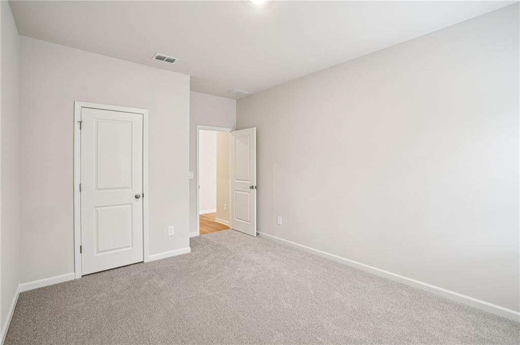 6939 Winchester Place Fairburn, GA 30213 - Photo 24 of 56 a view of an empty room