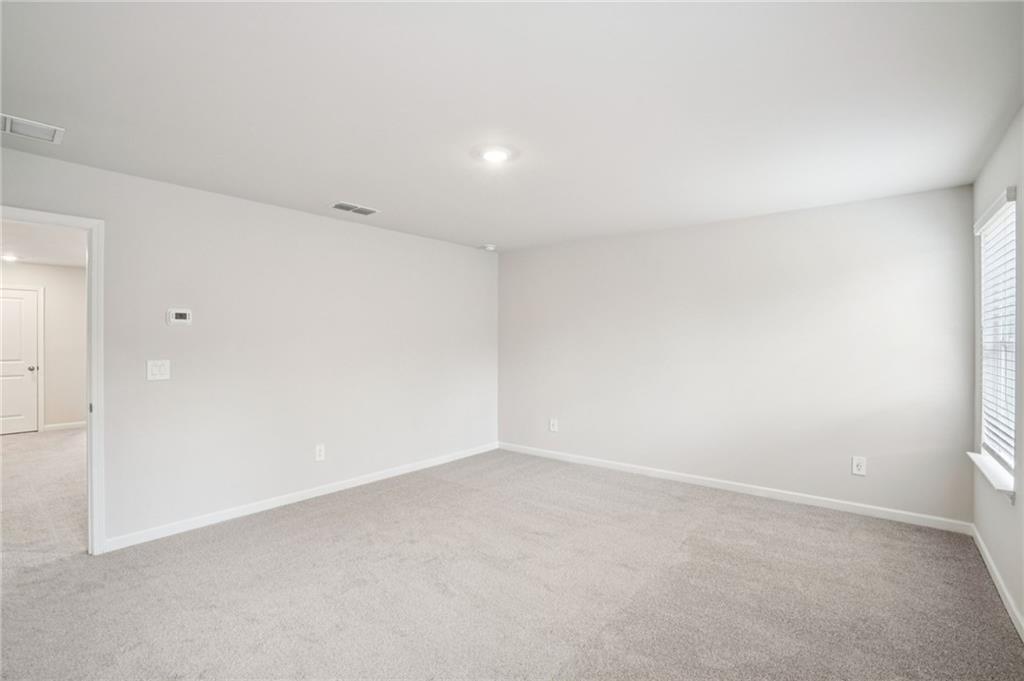 6939 Winchester Place Fairburn, GA 30213 - Photo 32 of 56 a view of empty room