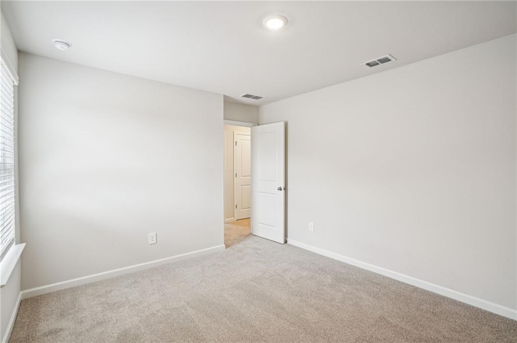 6939 Winchester Place Fairburn, GA 30213 - Photo 43 of 56 a view of an empty room