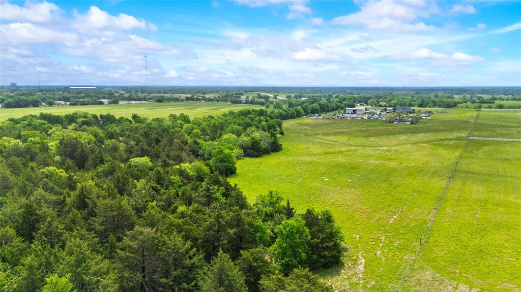 4511 County Road 4511 Commerce, TX 75428 - Photo 13 of 37 a view of an ocean and a yard