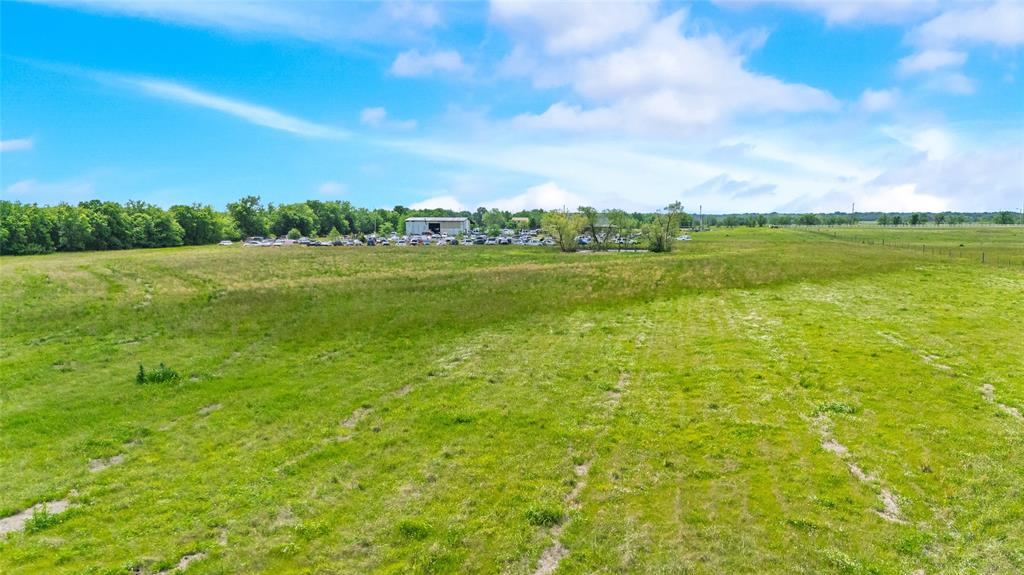 4511 County Road 4511 Commerce, TX 75428 - Photo 16 of 37 a view of an outdoor space with a lake view