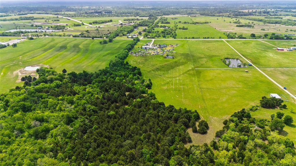 4511 County Road 4511 Commerce, TX 75428 - Photo 22 of 37 a view of an outdoor space and a lake view