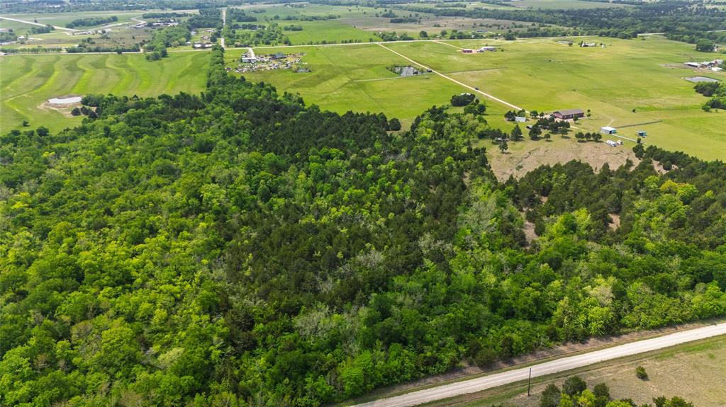 4511 County Road 4511 Commerce, TX 75428 - Photo 26 of 37 a view of a lake with a outdoor space