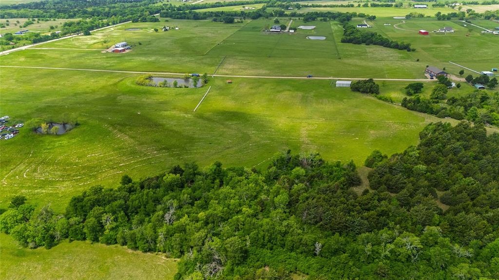 4511 County Road 4511 Commerce, TX 75428 - Photo 35 of 37 a view of an outdoor space and a lake view