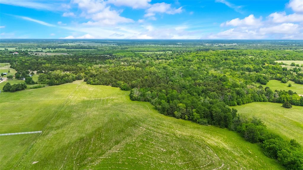 4511 County Road 4511 Commerce, TX 75428 - Photo 8 of 37 a view of an outdoor space with a lake view