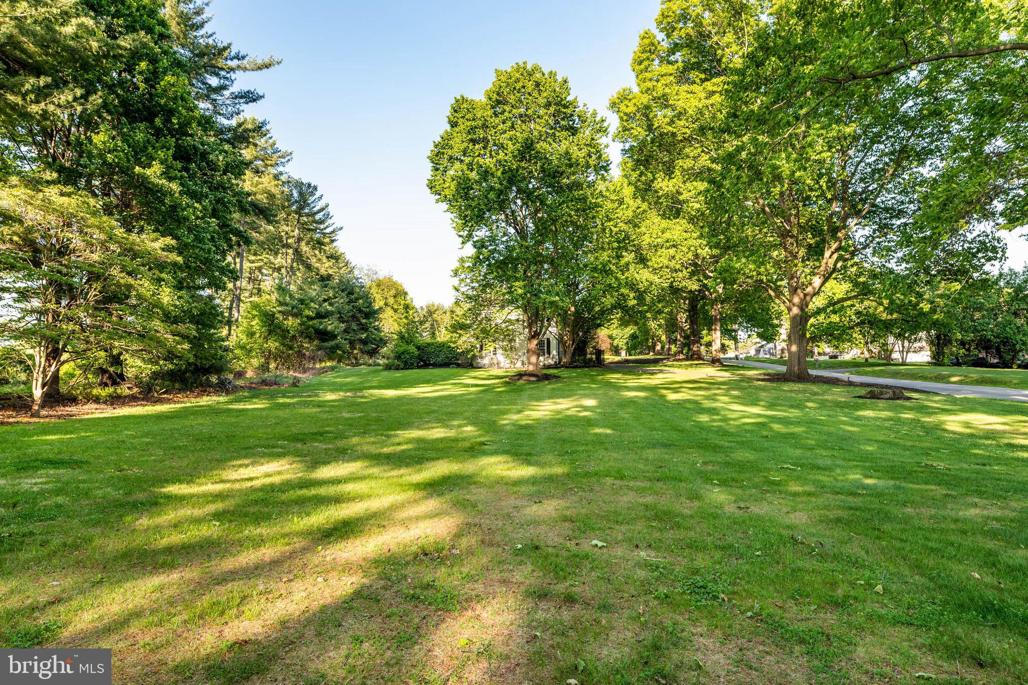 533 Gulph Road Wayne, PA 19087 - Photo 37 of 43 a view of green field with trees in the background