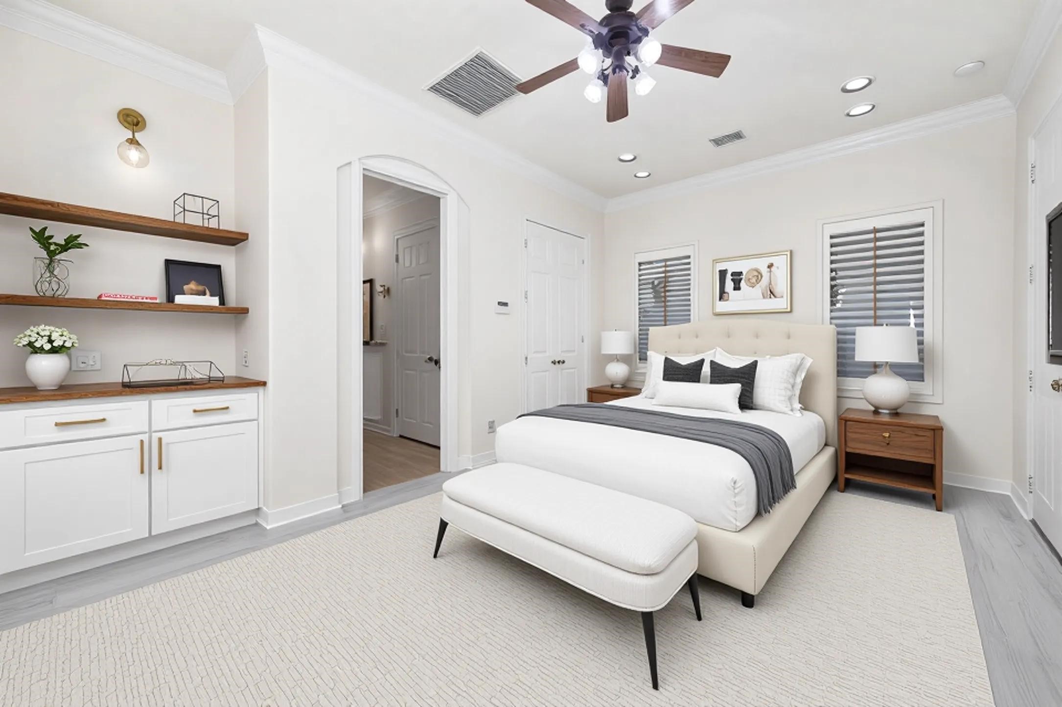 3323 Louvre Lane Houston, TX 77082 - Photo 12 of 50 a bedroom with a bed and a chandelier