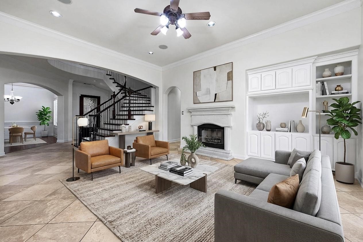 3323 Louvre Lane Houston, TX 77082 - Photo 2 of 50 a living room with furniture potted plant and a fireplace