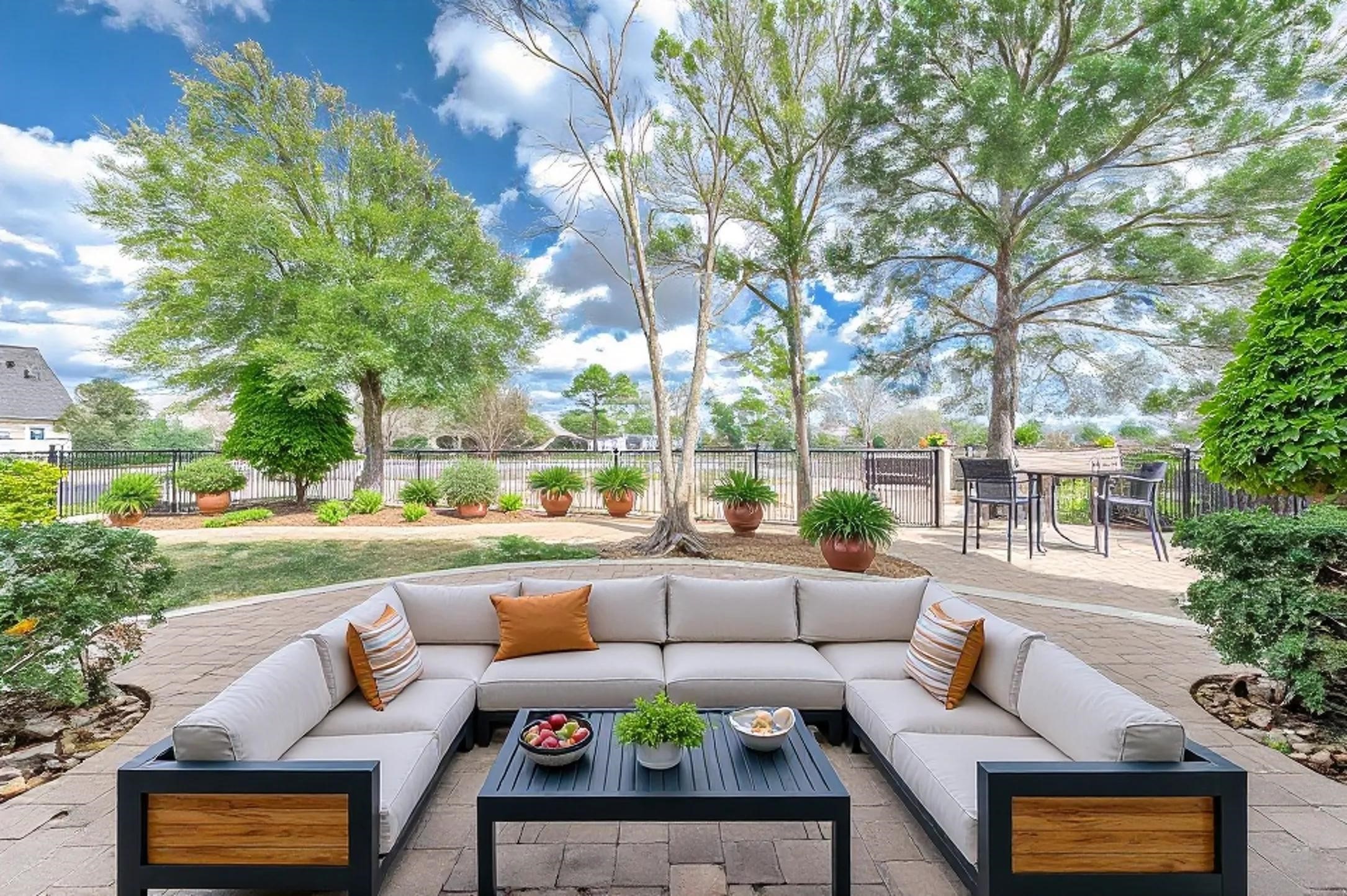 3323 Louvre Lane Houston, TX 77082 - Photo 6 of 50 a patio with patio a couch and trees