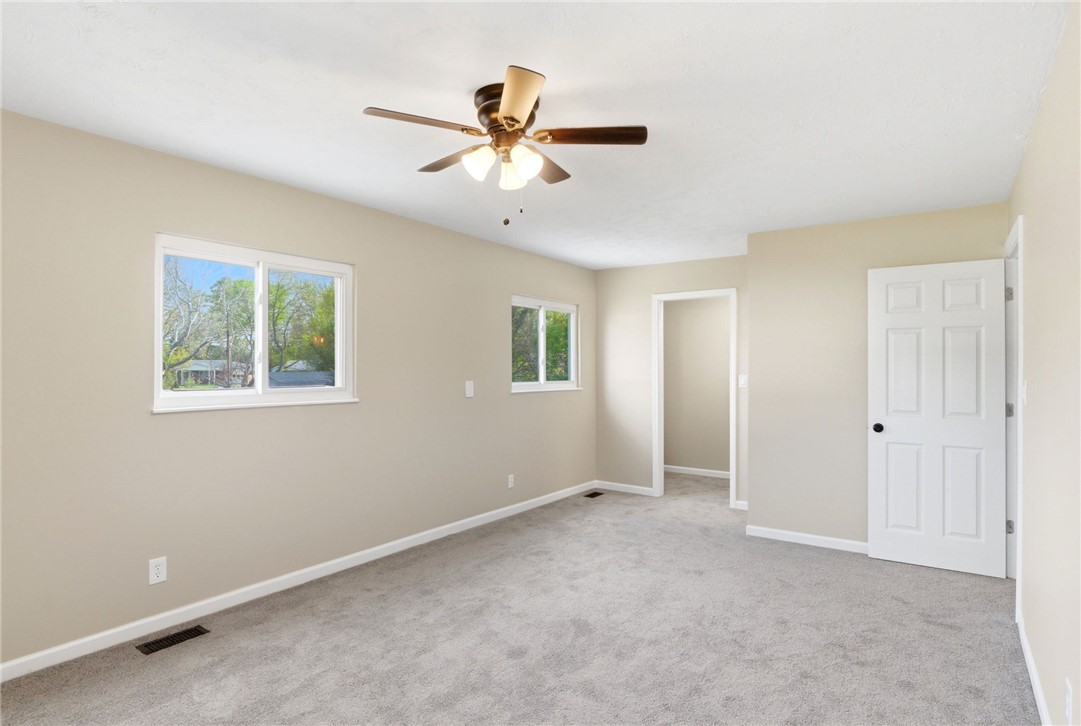40 Woods Road Springboro, OH 45066 - Photo 55 of 57 Bright and airy room with plush carpeting and natural light, perfect for a peaceful retreat.