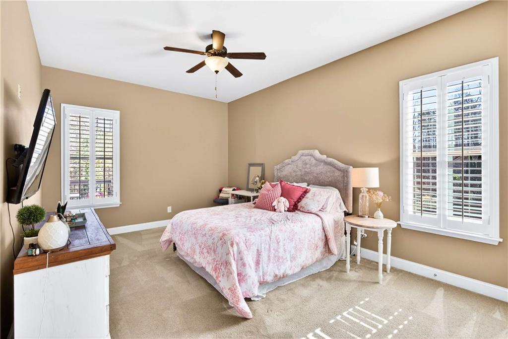 340 Scott Farm Drive Powder Springs, GA 30127 - Photo 22 of 59 a bedroom with a bed and a window