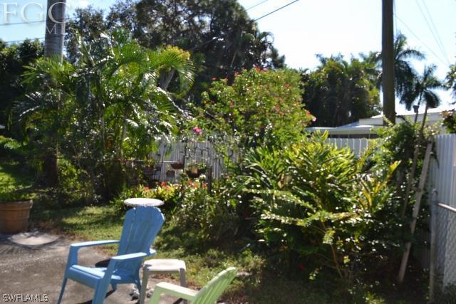 1724 Ardmore Road Fort Myers, FL 33901 - Photo 8 of 25 a view of a chairs and table in the patio