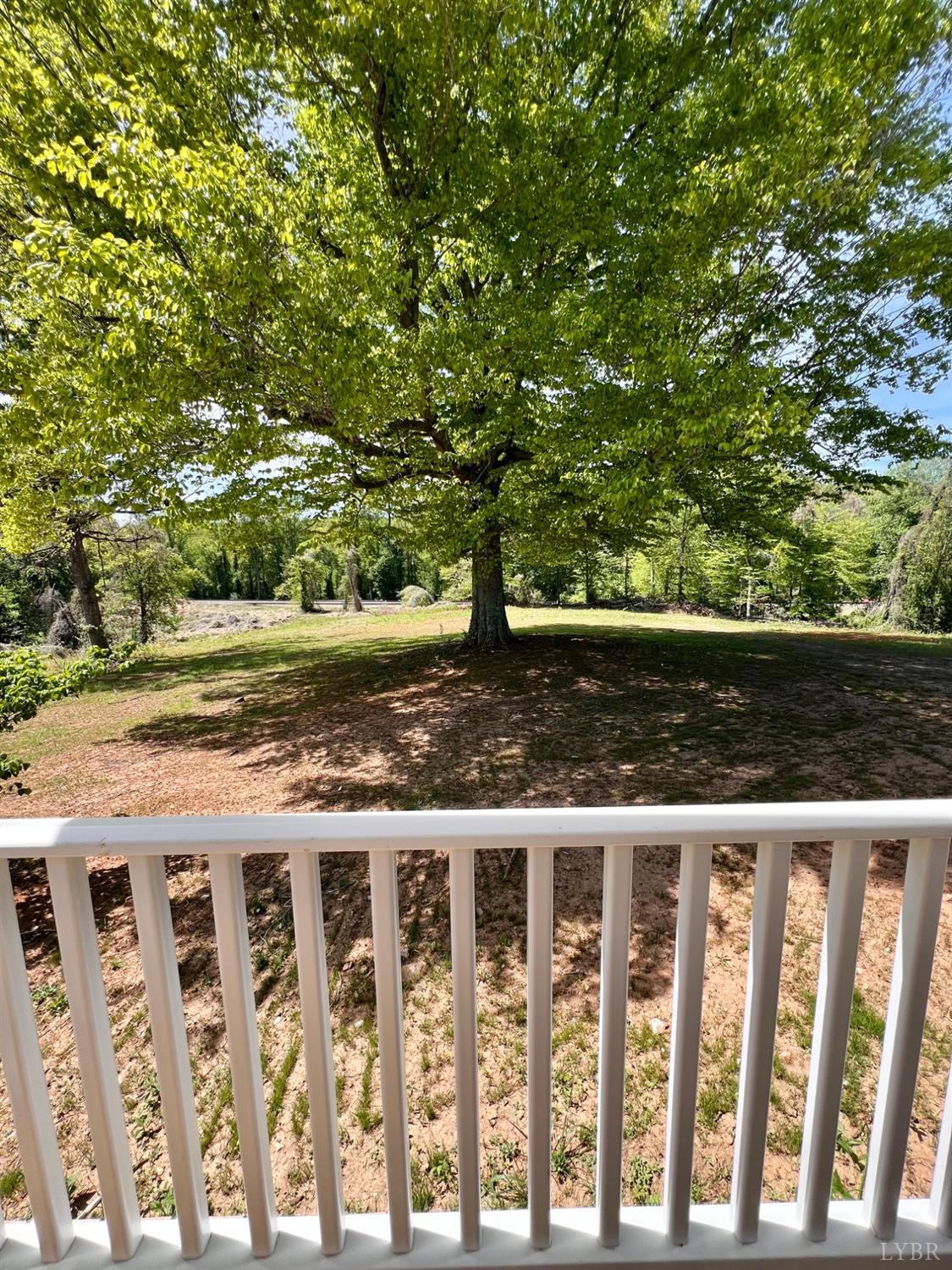 2107 Boxwood Farm Road Amherst, VA 24521 - Photo 23 of 33 a view of a balcony with a yard