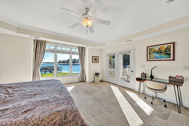 a large kitchen with stainless steel appliances kitchen island granite countertop a sink and cabinets
