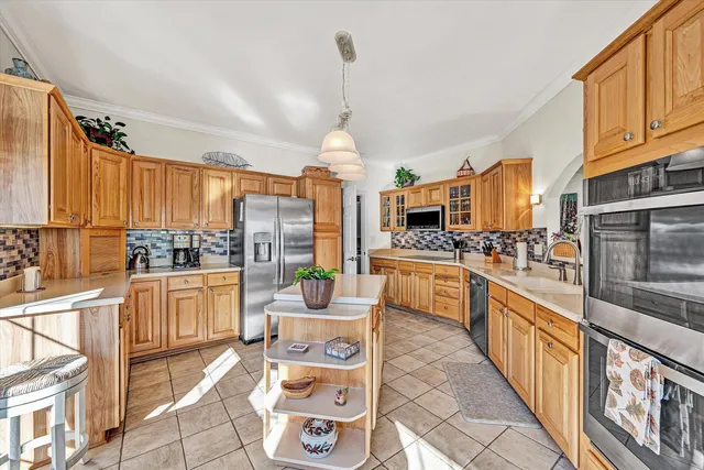 a reading room with furniture and a rug