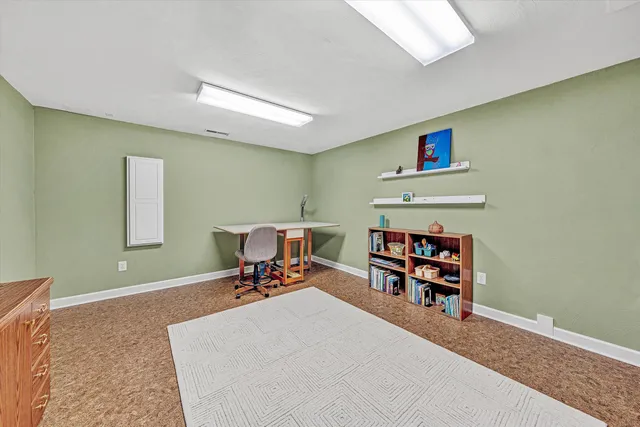 a view of a swimming pool with a lake view