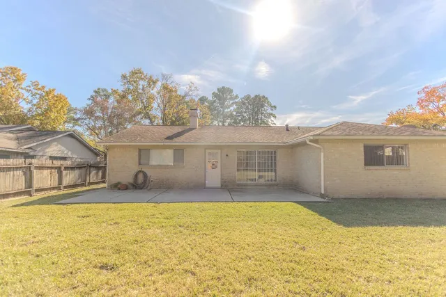 a view of a yard with an outdoor space