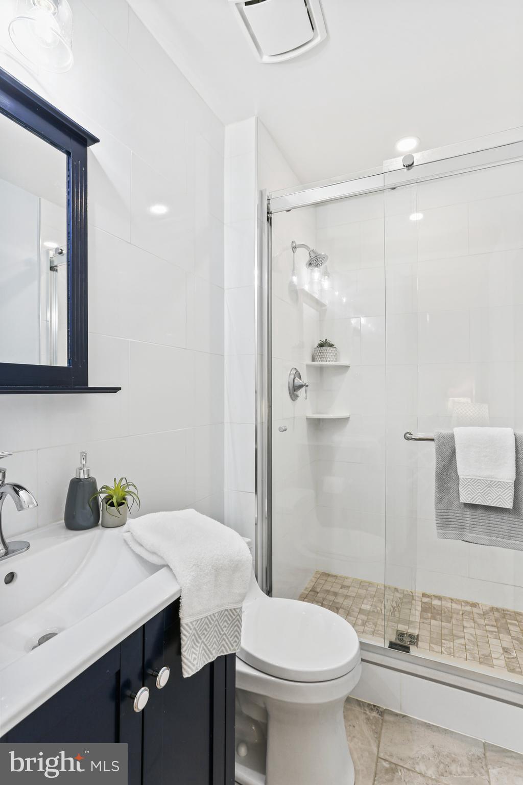 5813 Humblebee Road Columbia, MD 21045 - Photo 13 of 26 Primary en-suite bathroom updated vanity / shower