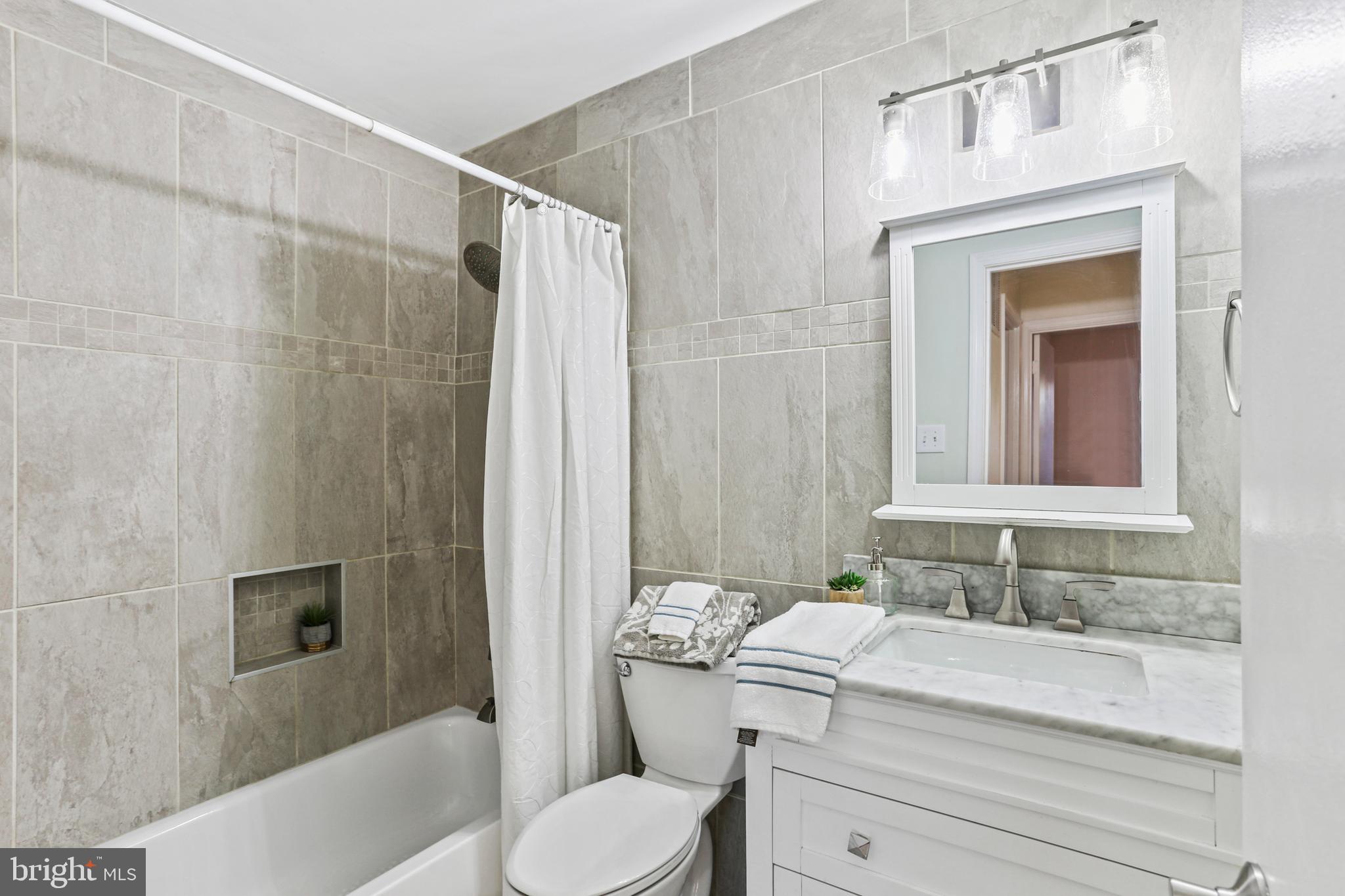 5813 Humblebee Road Columbia, MD 21045 - Photo 18 of 26 Updated exquisite second level bath in hallway