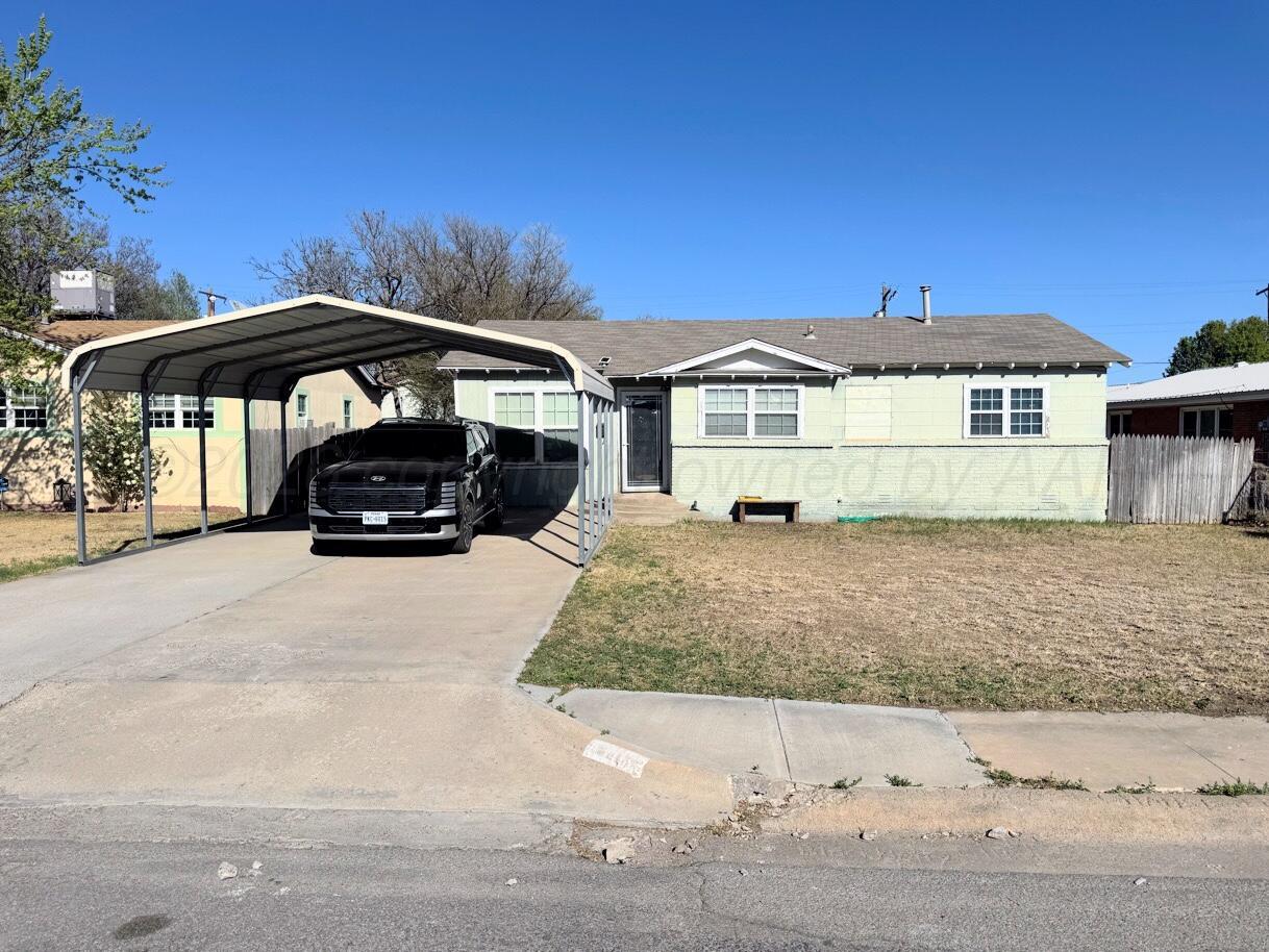 a car parked in front of a house
