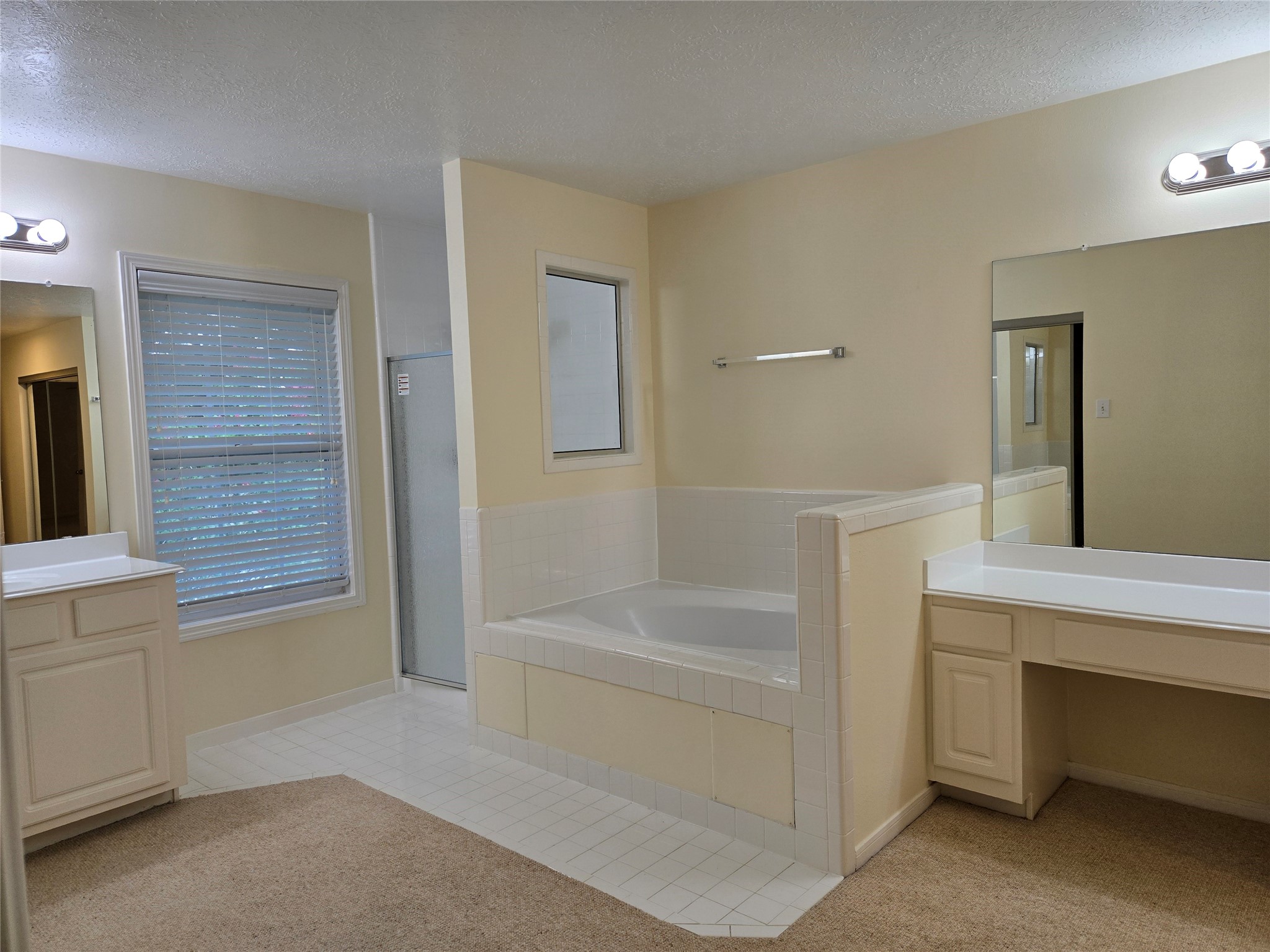 3138 Waters Way Drive Sugar Land, TX 77478 - Photo 33 of 42 a bathroom with a bathtub and a sink