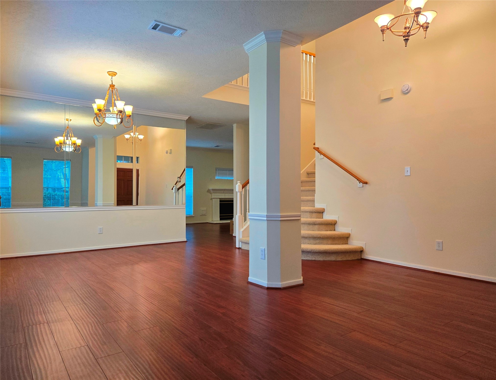 3138 Waters Way Drive Sugar Land, TX 77478 - Photo 6 of 42 wooden floor in an empty room with a mirror