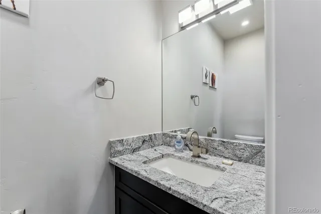 a bedroom with bed and window