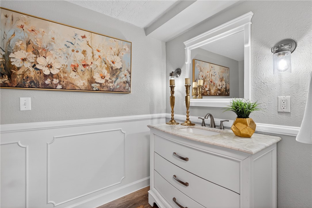 103 Granby Place Portland, TX 78374 - Photo 20 of 40 a bathroom with a granite countertop sink and a mirror