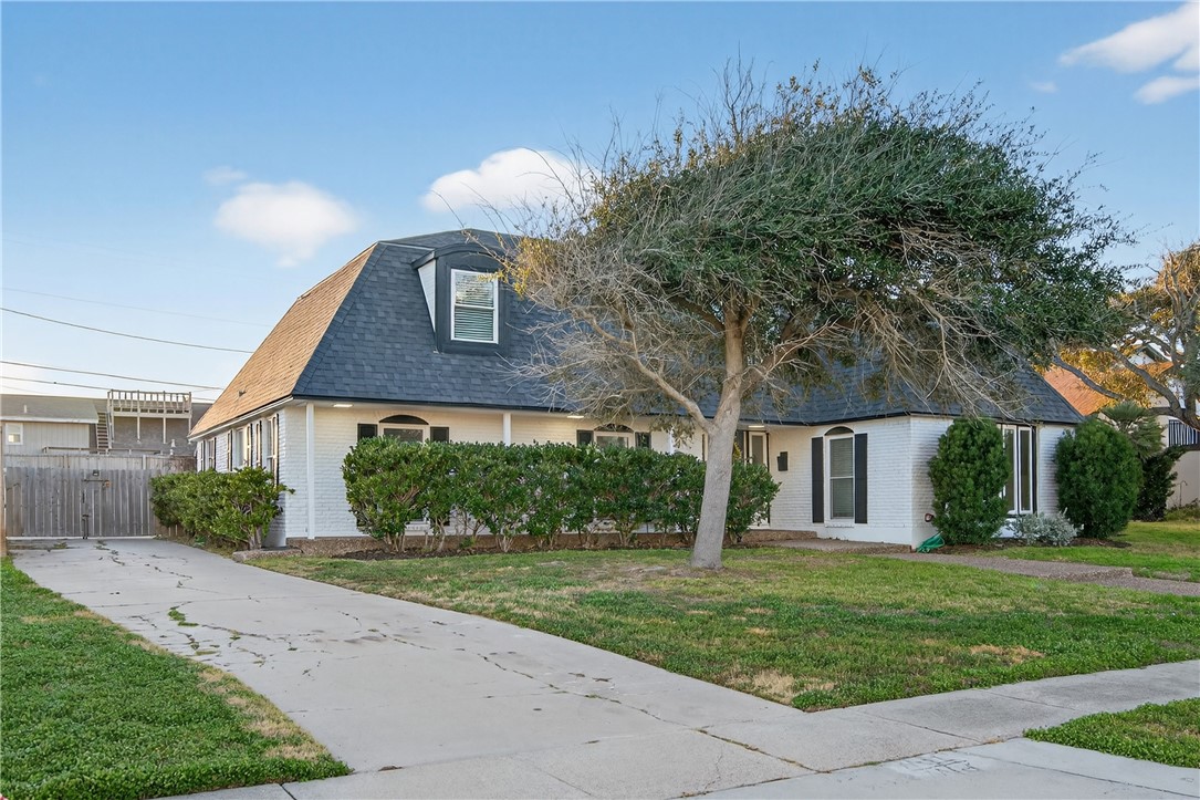 103 Granby Place Portland, TX 78374 - Photo 2 of 40 a front view of a house with a yard