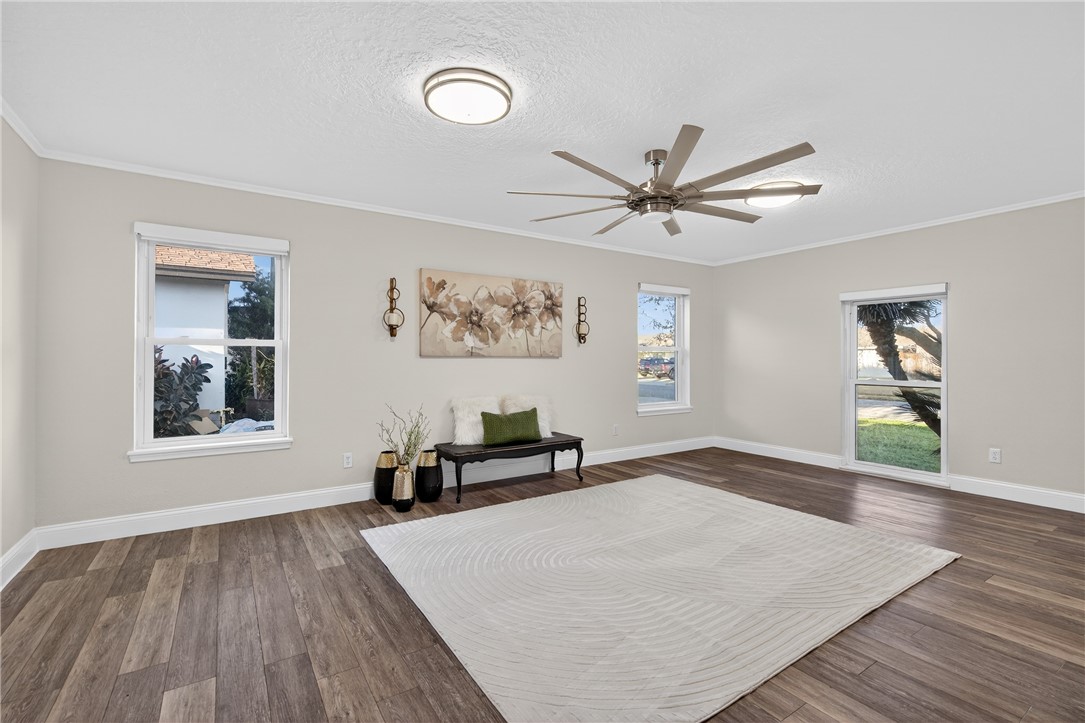 103 Granby Place Portland, TX 78374 - Photo 21 of 40 wooden floor in a empty room with a window