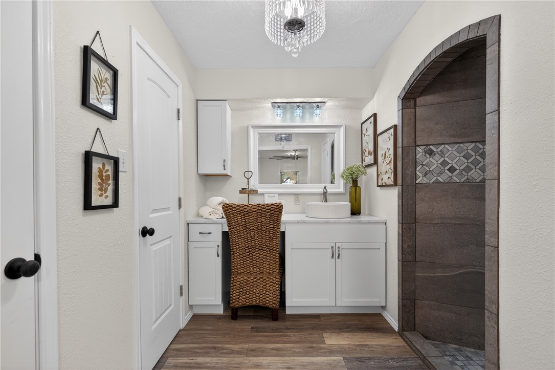 103 Granby Place Portland, TX 78374 - Photo 22 of 40 a kitchen with stainless steel appliances a refrigerator and cabinets