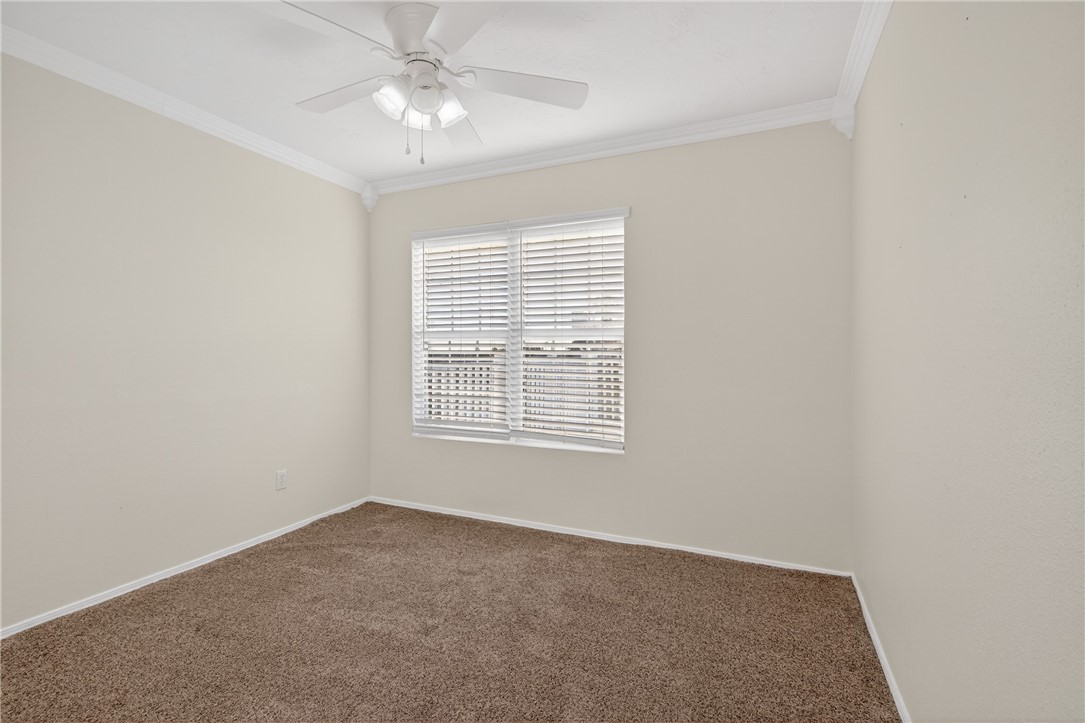 103 Granby Place Portland, TX 78374 - Photo 31 of 40 a view of an empty room with a window