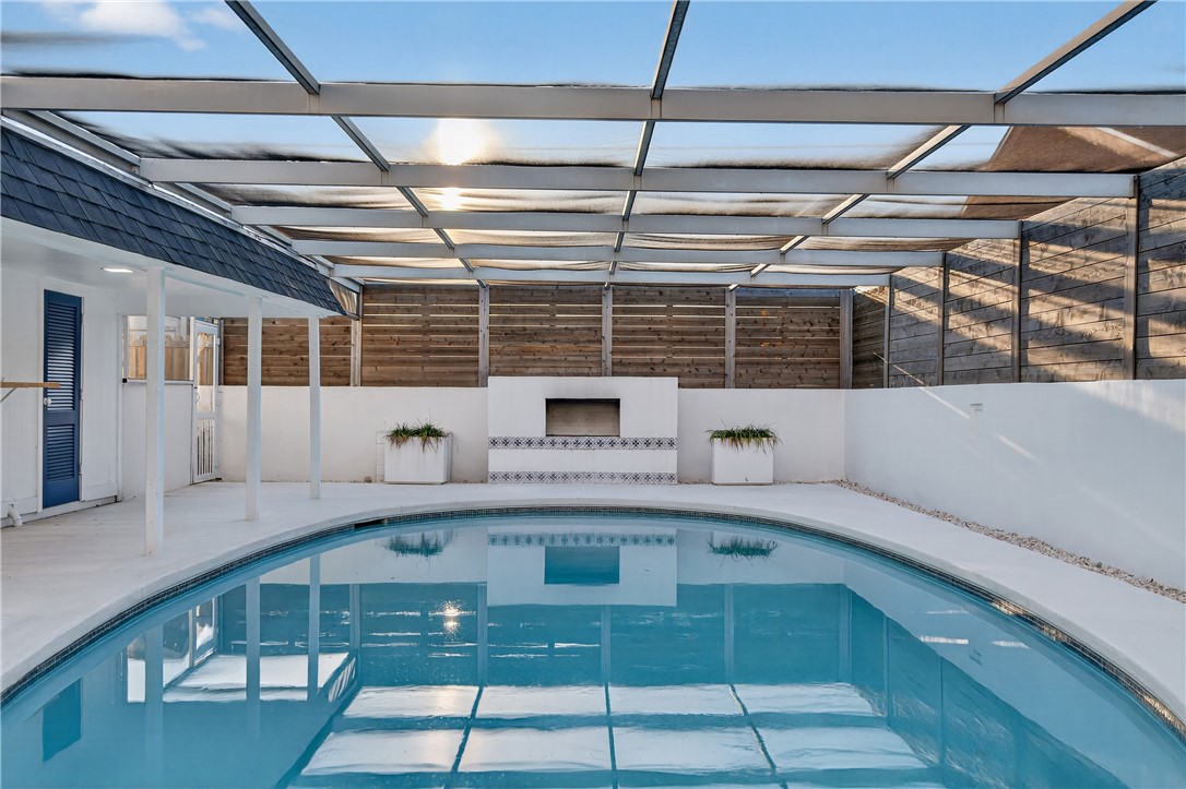 103 Granby Place Portland, TX 78374 - Photo 37 of 40 a kitchen with a sink a counter top space and cabinets