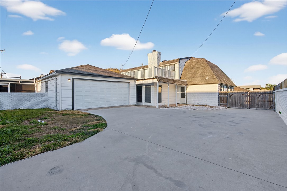 103 Granby Place Portland, TX 78374 - Photo 39 of 40 a view of a house with a yard