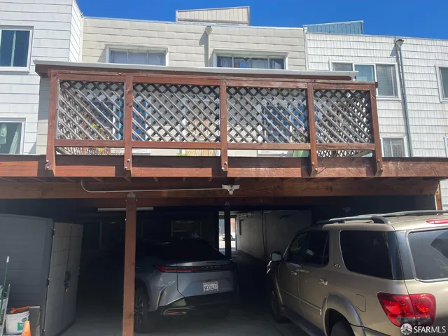 a bathroom with two sinks and a mirror