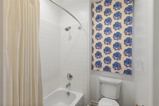 a bathroom with a granite countertop sink a mirror and vanity