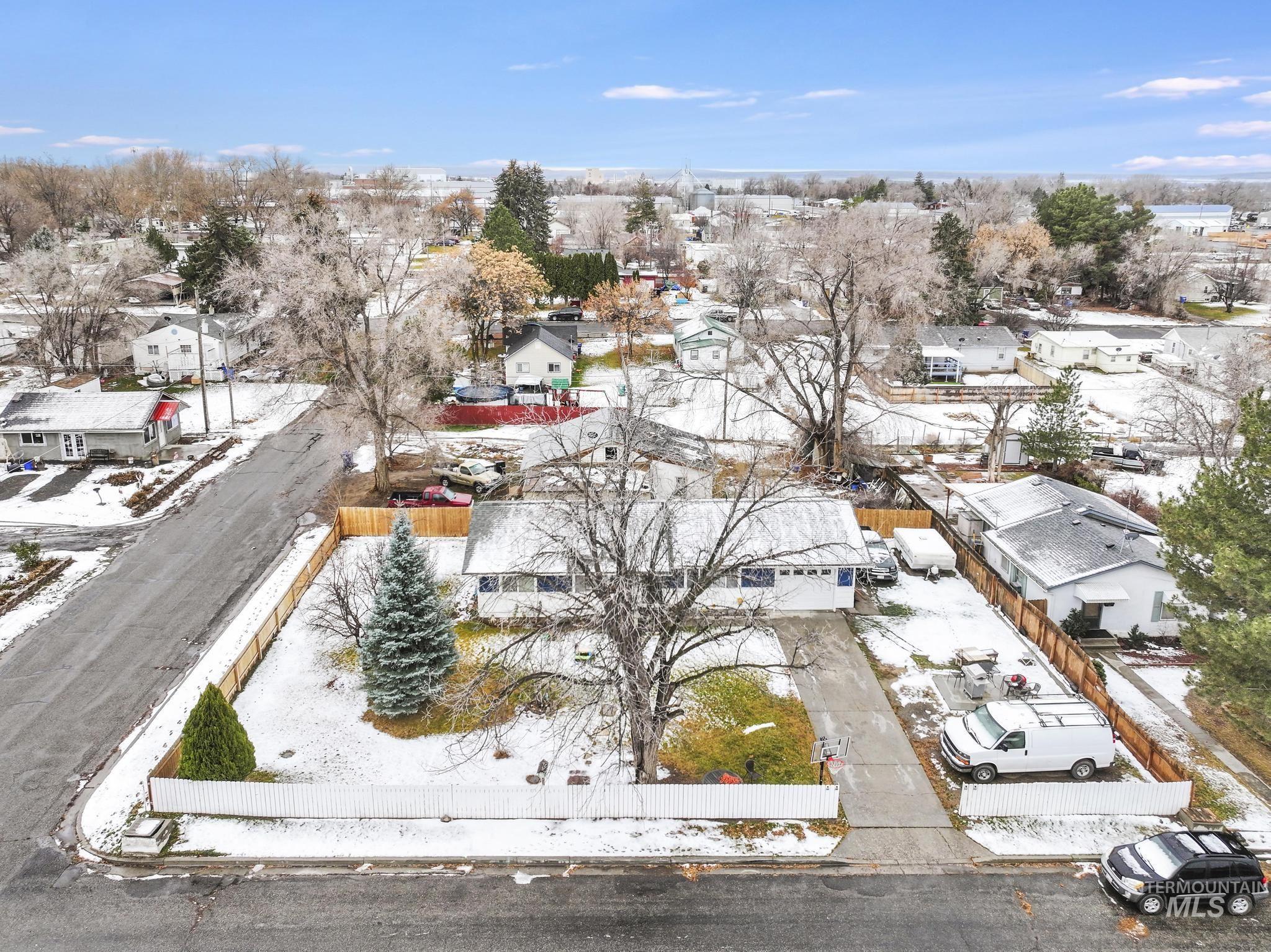 403 3rd Avenue West Jerome, ID 83338 - Photo 25 of 36 Snowy aerial view featuring a residential view
