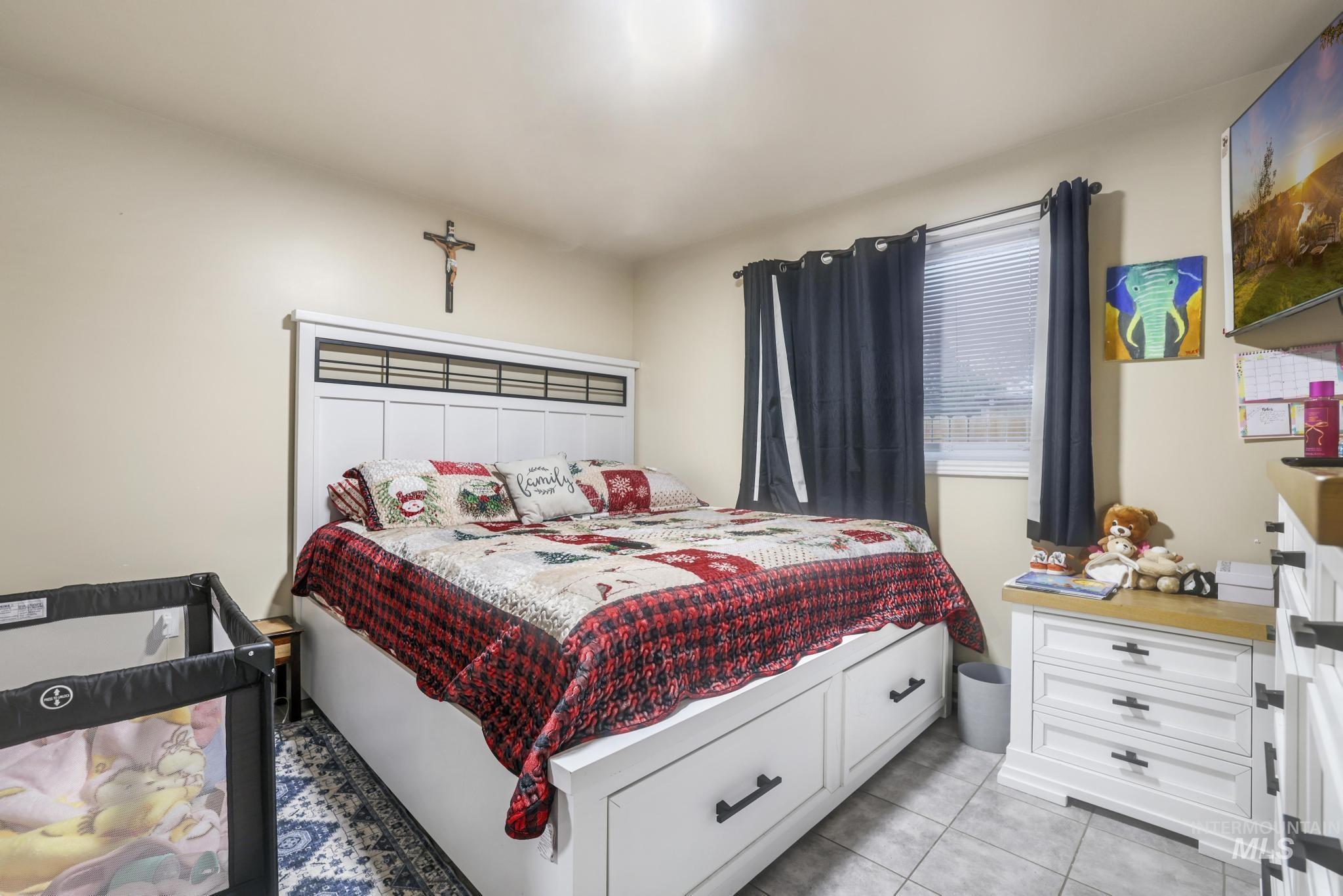 403 3rd Avenue West Jerome, ID 83338 - Photo 6 of 36 Bedroom featuring light tile patterned floors
