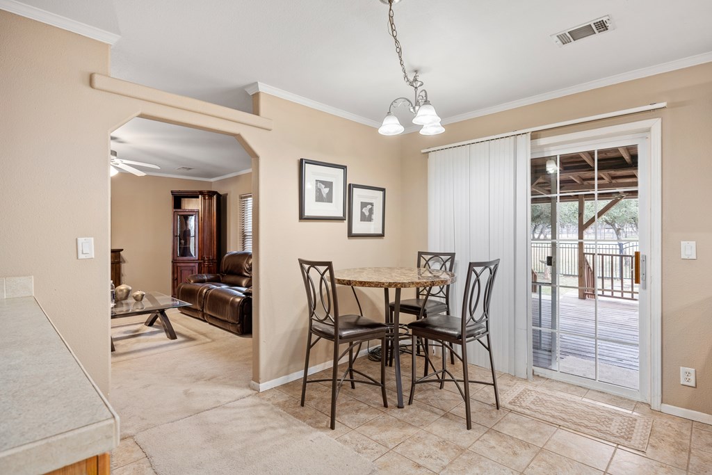3955 Klein Branch Road Harper, TX 78631 - Photo 12 of 40 a view of a dining room with furniture