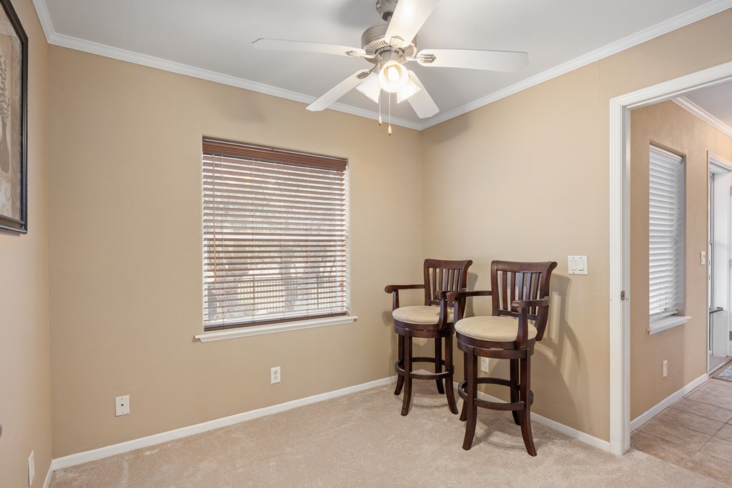 3955 Klein Branch Road Harper, TX 78631 - Photo 22 of 40 a view of a workspace with furniture and a window