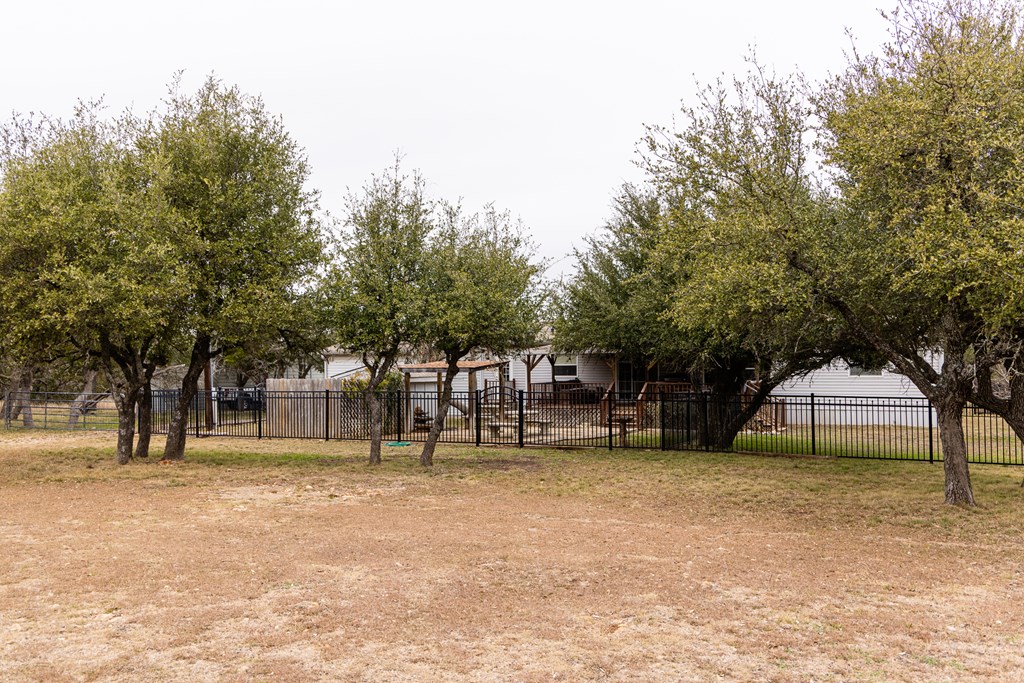 3955 Klein Branch Road Harper, TX 78631 - Photo 32 of 40 a swimming pool with outdoor seating and yard