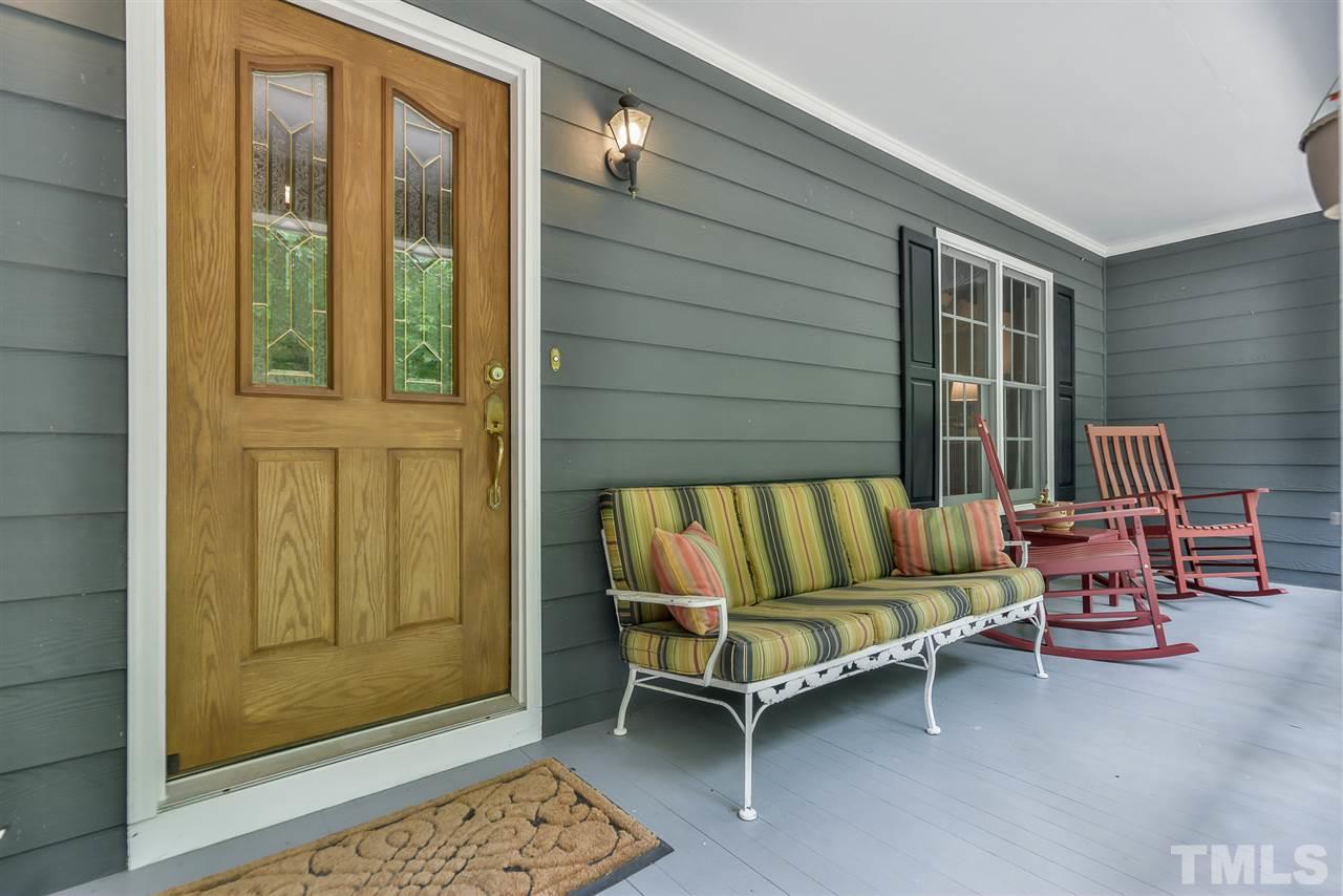 5114 Guess Road Rougemont, NC 27572 - Photo 3 of 22 a couch sitting in front of a window