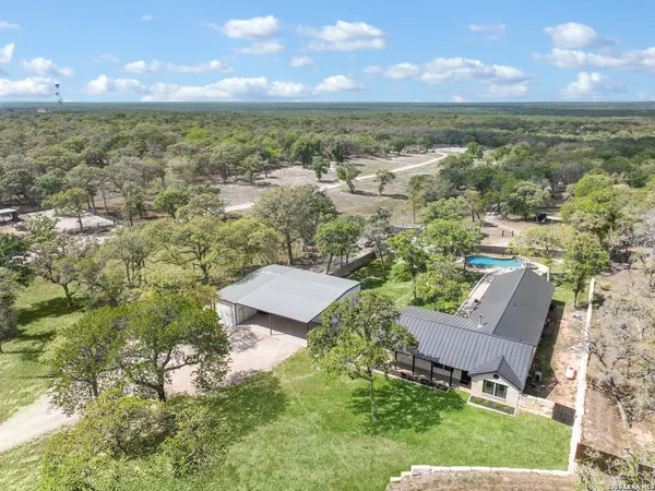 a view of a city with a lake in the background