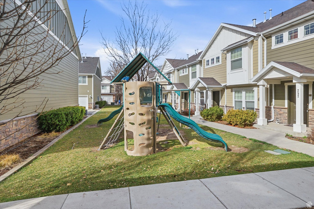 1024 South 270 West Logan, UT 84321 - Photo 29 of 37 Community jungle gym featuring a residential view and a yard
