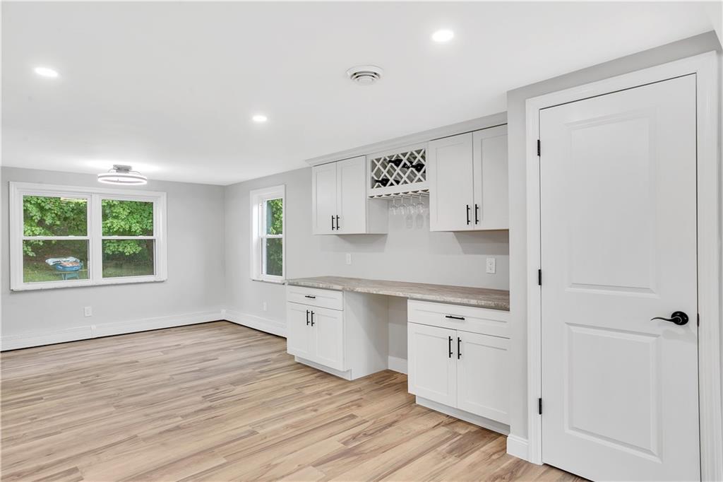 2 Hillcrest Drive Cecil, PA 15321 - Photo 15 of 25 a view of cabinets a wooden floor and windows in a room