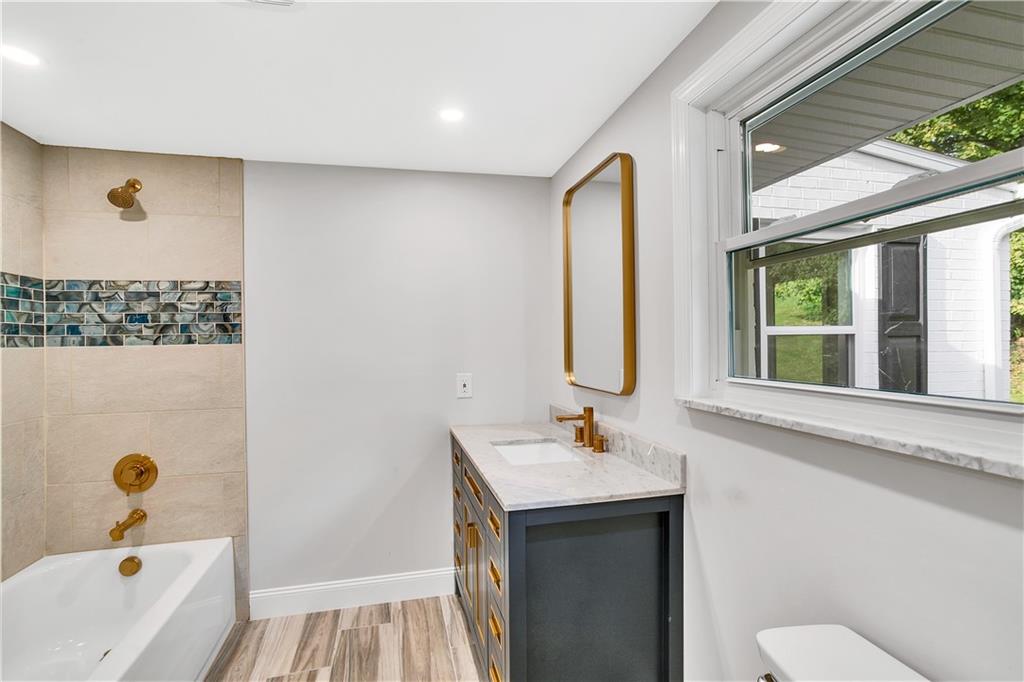 2 Hillcrest Drive Cecil, PA 15321 - Photo 20 of 25 a bathroom with a sink and a mirror