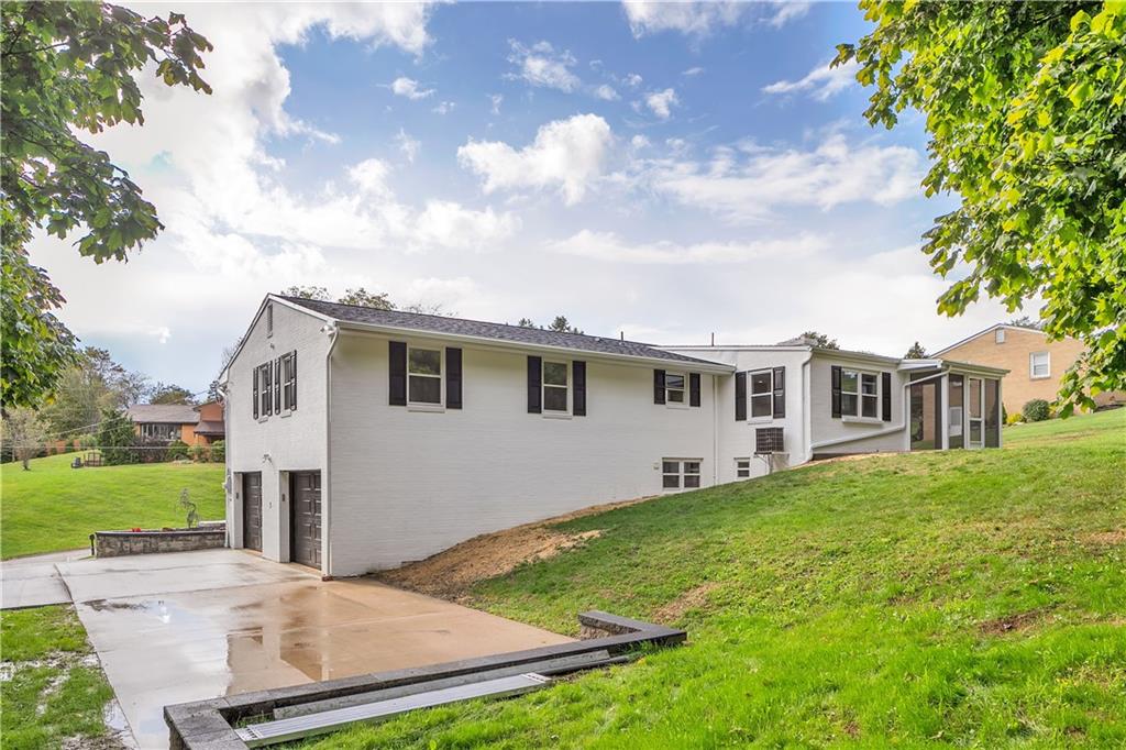 2 Hillcrest Drive Cecil, PA 15321 - Photo 3 of 25 a front view of a house with garden