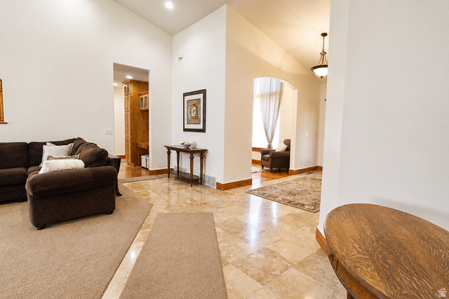 1055 North 1000 East Mapleton, UT 84664 - Photo 19 of 112 Vaulted ceilings enhance the bright interior featuring recessed lighting and an arched entryway