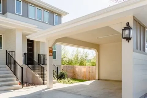 a view of a house with a street